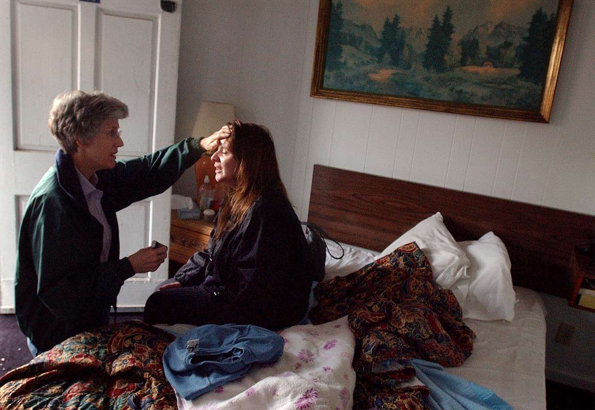 Pamela Atkinson checks up on Cricket at the Allstar Hotel on North Temple on May 15, 2003. Atkinson died on Saturday at the age of 93.