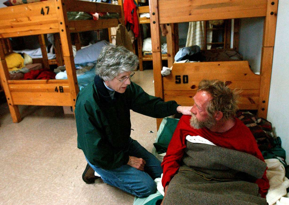 Pamela Atkinson visits with Scotty at the Volunteers of America Utah Detoxification Center on May 8, 2003. Atkinson died on Saturday at the age of 93.