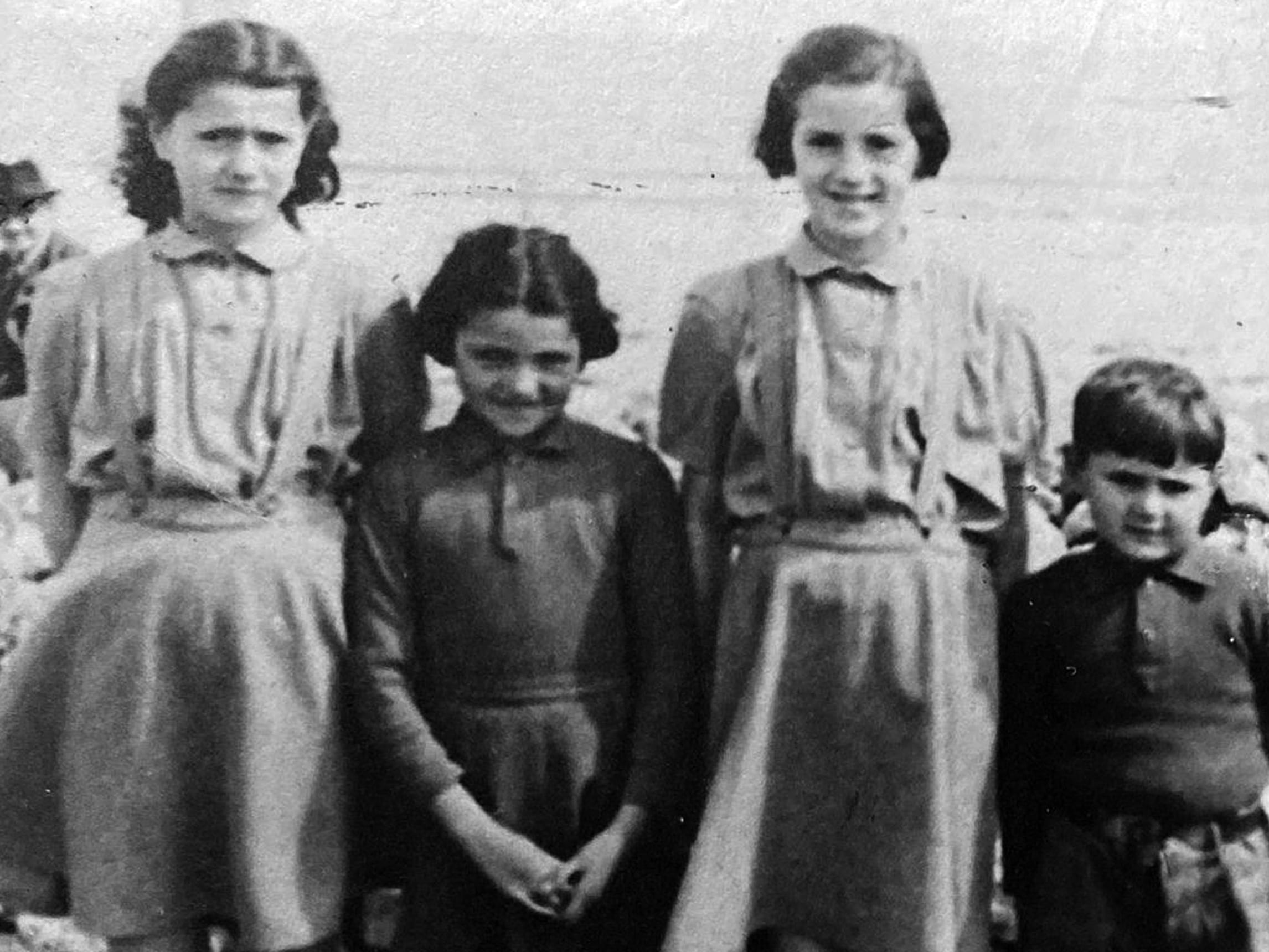 Pamela Atkinson and her sisters in this undated photo. Atkinson died on Saturday at the age of 93.
