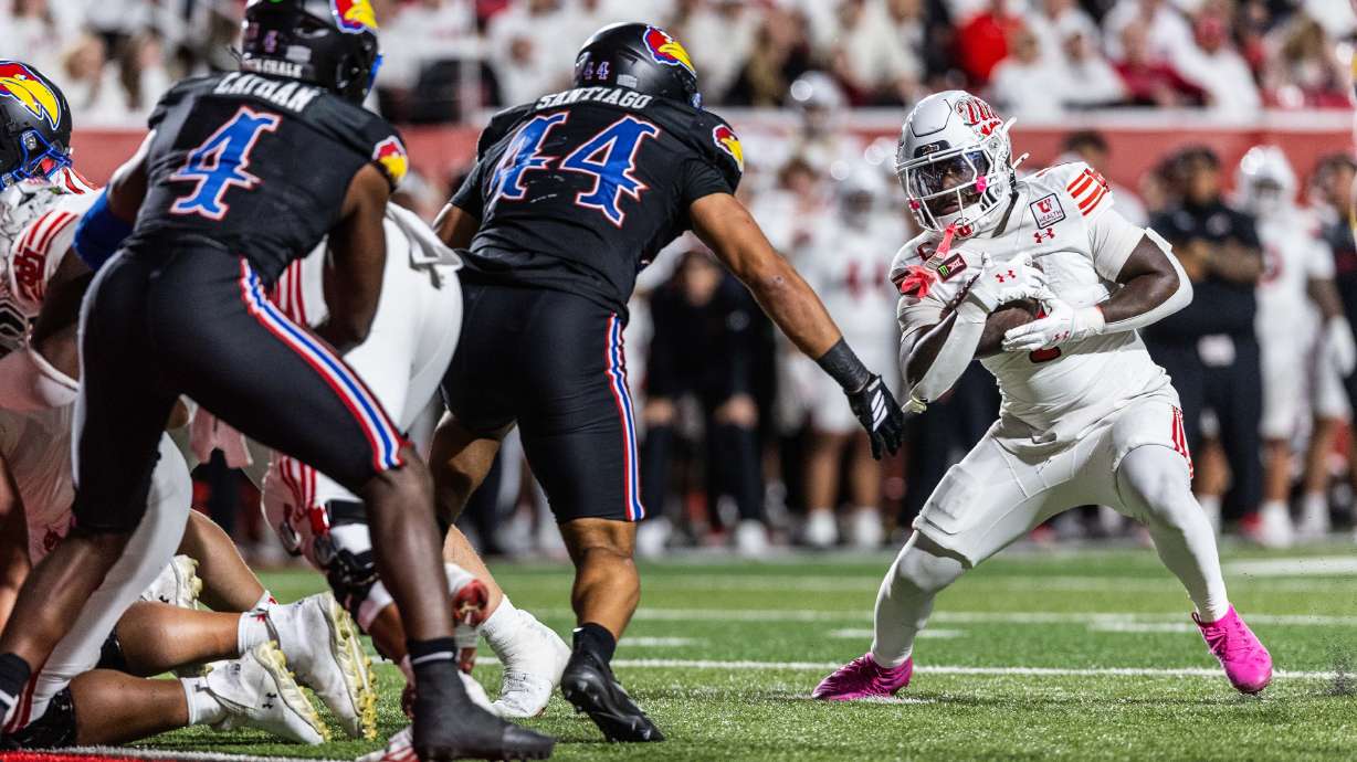 Utah Utes running back Wayshawn Parker (1) runs with the ball during a game against Kansas at Rice-Eccles Stadium in Salt Lake City on Saturday, Oct. 10, 2026.