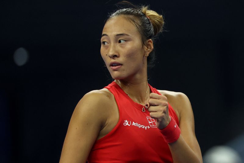 Tennis - China Open - National Tennis Center, Beijing, China - October 11, 2026 China's Qinwen Zheng reacts during her final match against Russia's Mirra Andreeva
