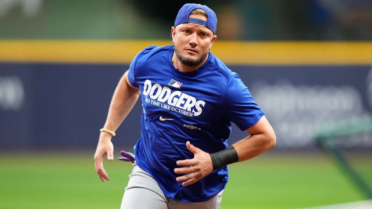 Los Angeles Dodgers' Miguel Rojas works out ahead of Game 1 of baseball's National League Championship Series between the Milwaukee Brewers and the Los Angeles Dodgers, Saturday, Oct. 10, 2026, in Milwaukee.