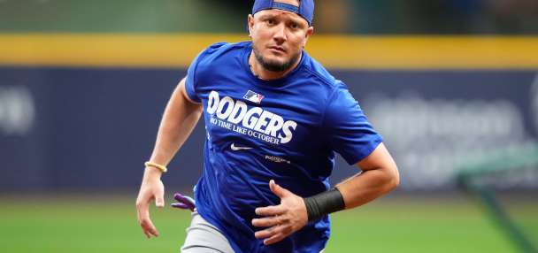 Dodgers keep infielder Miguel Rojas on their NLCS roster against the Brewers