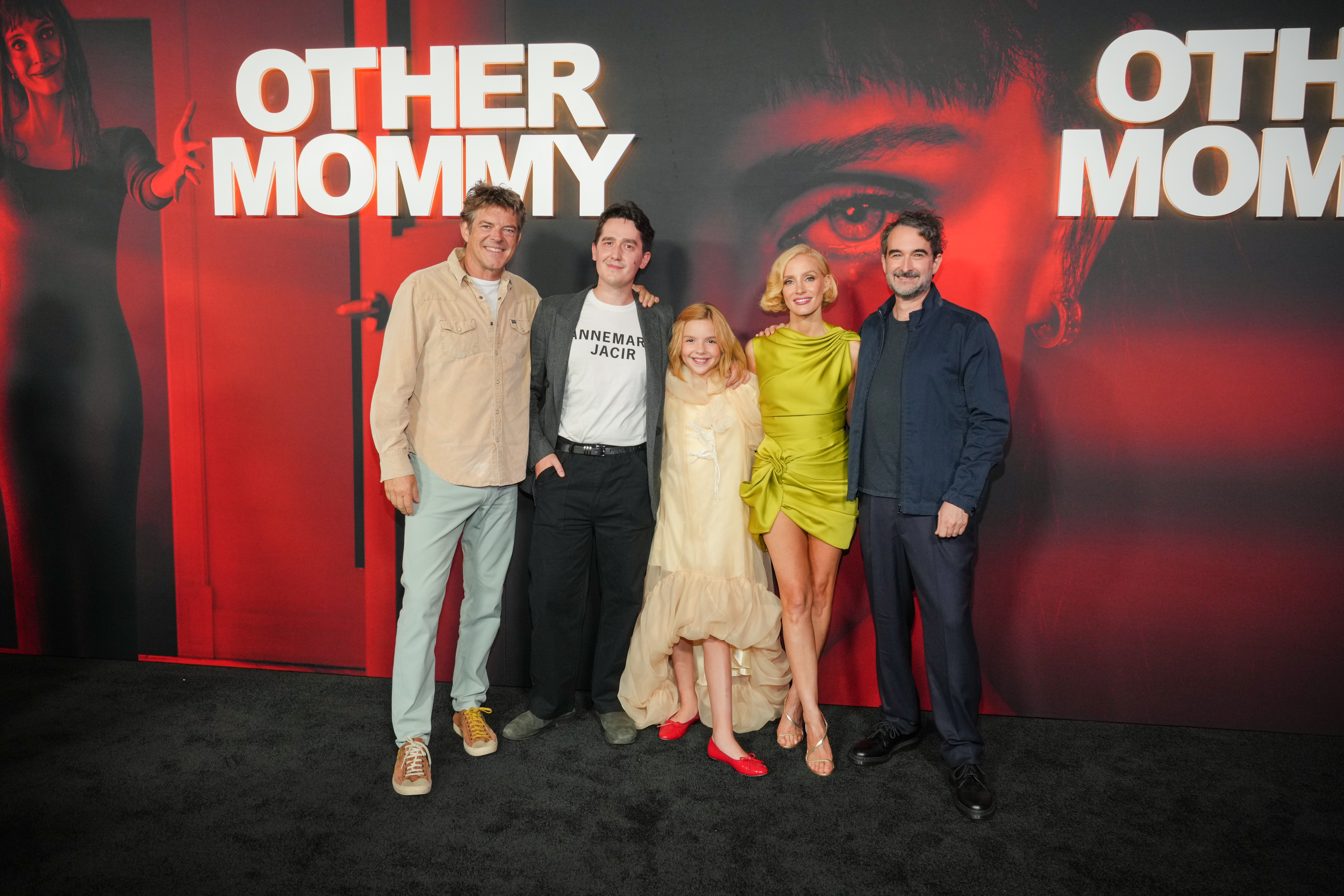 Jason Blum, from left, director Rob Savage, Arabella Olivia Clark, Jessica Chastain, and Jay Duplass arrive at the premiere of "Other Mommy" on Thursday, at the Universal Cinema AMC at CityWalk Hollywood in Los Angeles.