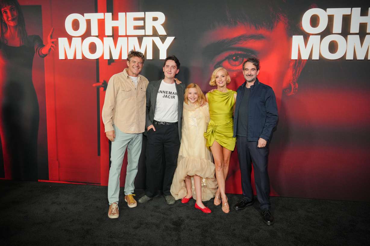 Jason Blum, from left, director Rob Savage, Arabella Olivia Clark, Jessica Chastain, and Jay Duplass arrive at the premiere of "Other Mommy" on Thursday, at the Universal Cinema AMC at CityWalk Hollywood in Los Angeles.