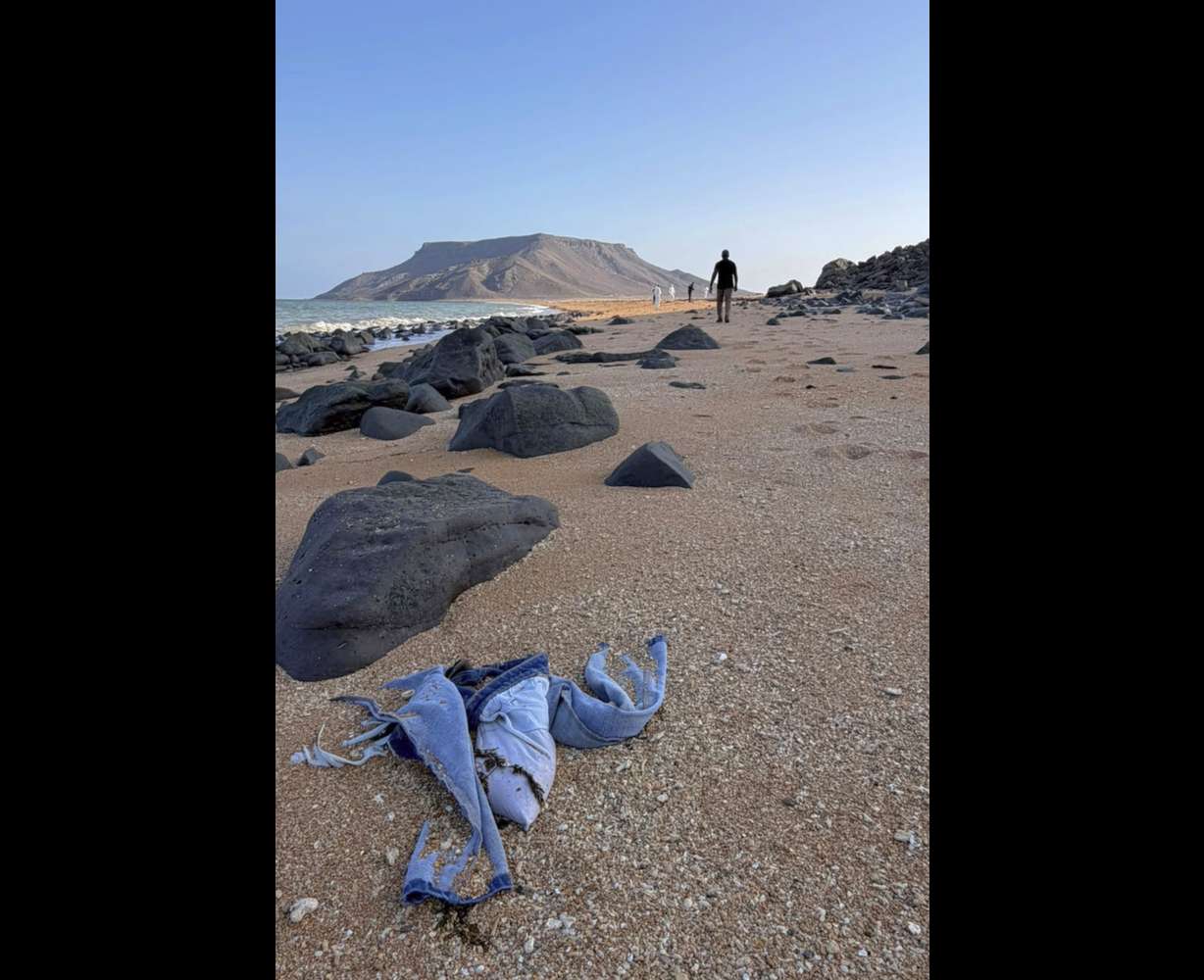 This image provided by the International Organization for Migration shows authorities intervening after a migrant ship capsized near Guhere, north of Obock, in Djibouti, Saturday.
