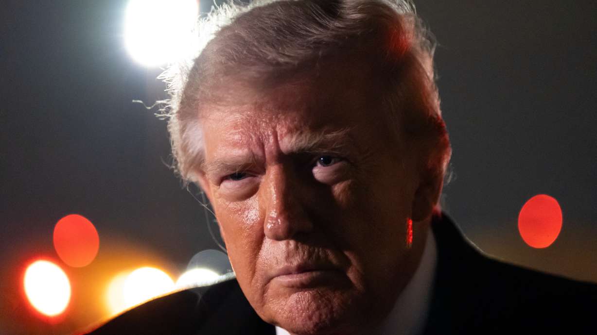 President Donald Trump speaks with reporters as he arrives on Air Force One, Saturday, at Joint Base Andrews, Md. A bipartisan group of six senators called for the Trump administration to "immediately reverse course" on a plan to purchase diesel from Russia as part of an effort to lower high fuel prices.