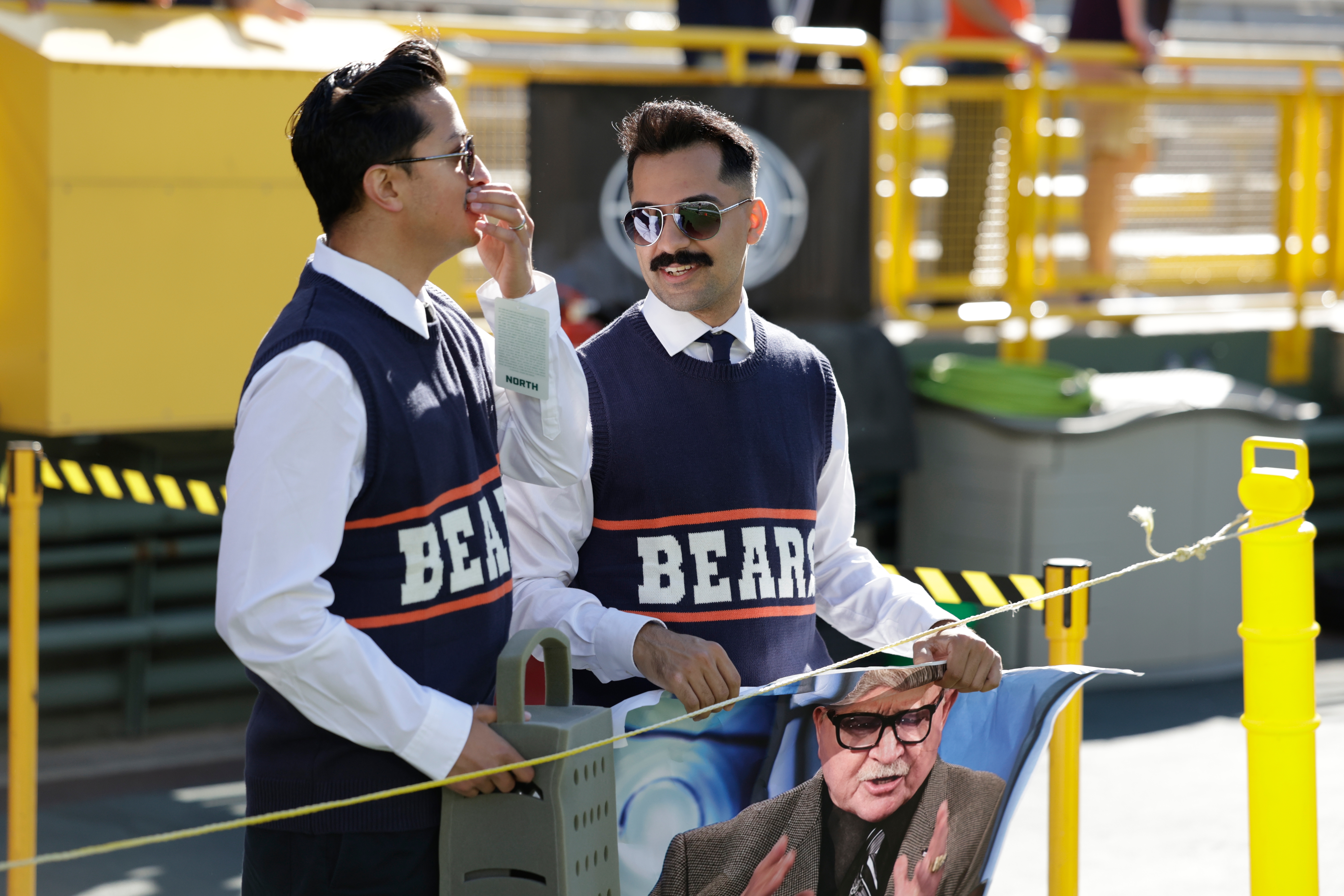 Chicago Bears fans dress up as Mike Ditka before an NFL football game against the Green Bay Packers in Green Bay, Wis., Sunday, Oct. 11, 2026. 