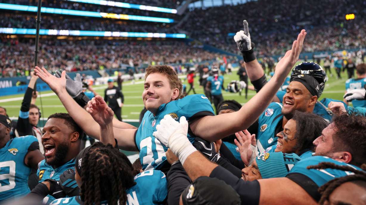 Jacksonville Jaguars place kicker Cam Little (39) celebrates after scoring the winning field goal during an NFL football game against Philadelphia Eagles in London, Sunday, Oct. 11, 2026.