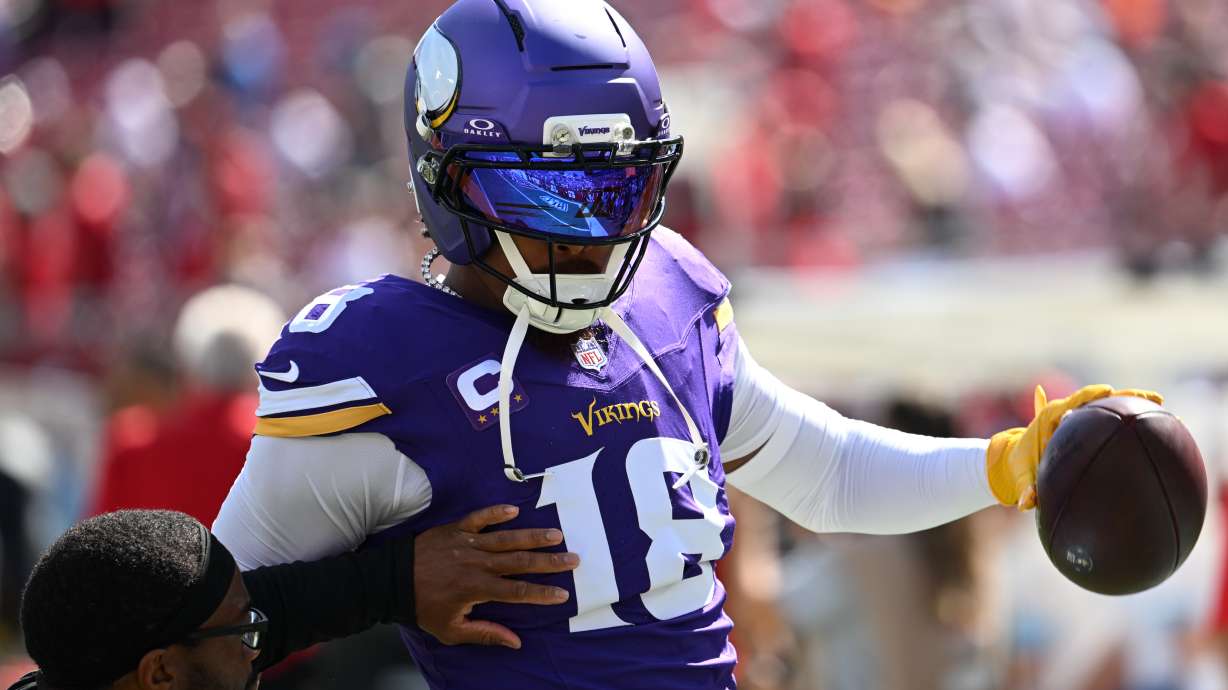 Minnesota Vikings wide receiver Justin Jefferson (18) warms up before an NFL football game against the Tampa Bay Buccaneers in Tampa, Fla., Sunday, Sept. 27, 2026.