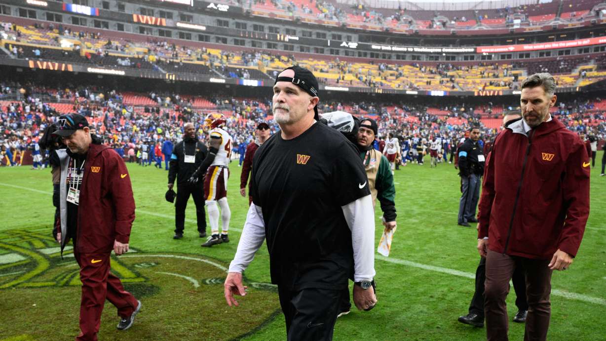 Washington Commanders head coach Dan Quinn leaves the field after an NFL football game against the New York Giants in Landover, Md., Sunday, Oct. 11, 2026.