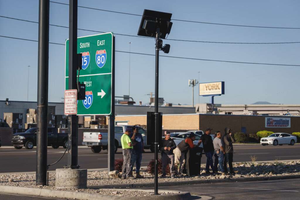 Flock Safety cameras are mounted on a pole in the parking lot of the Home Depot in Salt Lake City on Aug. 25.