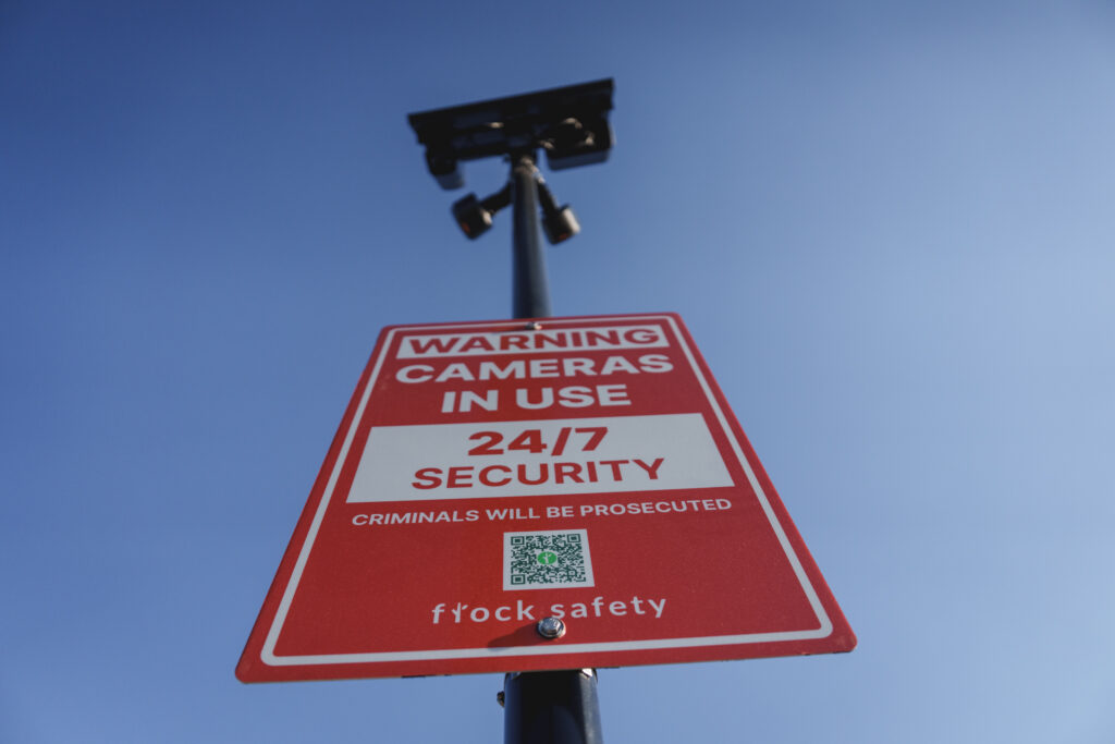 Flock Safety cameras are mounted on a pole in the parking lot of the Home Depot in Salt Lake City, Aug. 25.