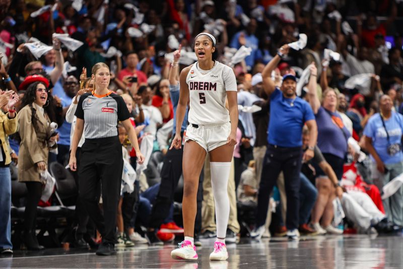 Oct 4, 2026; Atlanta, Georgia, USA; Atlanta Dream forward Angel Reese (5) in action against the New York Liberty in the fourth quarter during game one of the second round for the 2026 WNBA Playoffs at State Farm Arena.