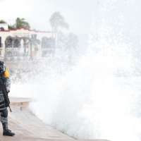 Hurricane Simon weakens to Category 2 as it continues to lash Mexico's Pacific coast