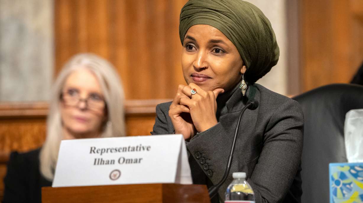 Rep. Ilhan Omar, D-Minn., listens during a Congressional spotlight hearing on Capitol Hill, Sept. 22, in Washington.