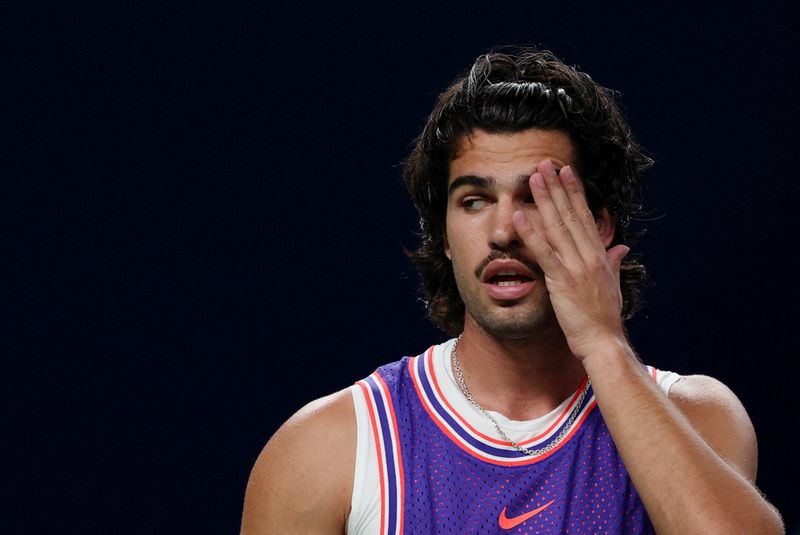 Tennis - ATP Masters 1000 - Shanghai Masters - Qizhong Forest Sports City Arena, Shanghai, China - October 12, 2026 Spain's Carlos Alcaraz reacts during his round of 32 match against Belgium's Zizou Bergs