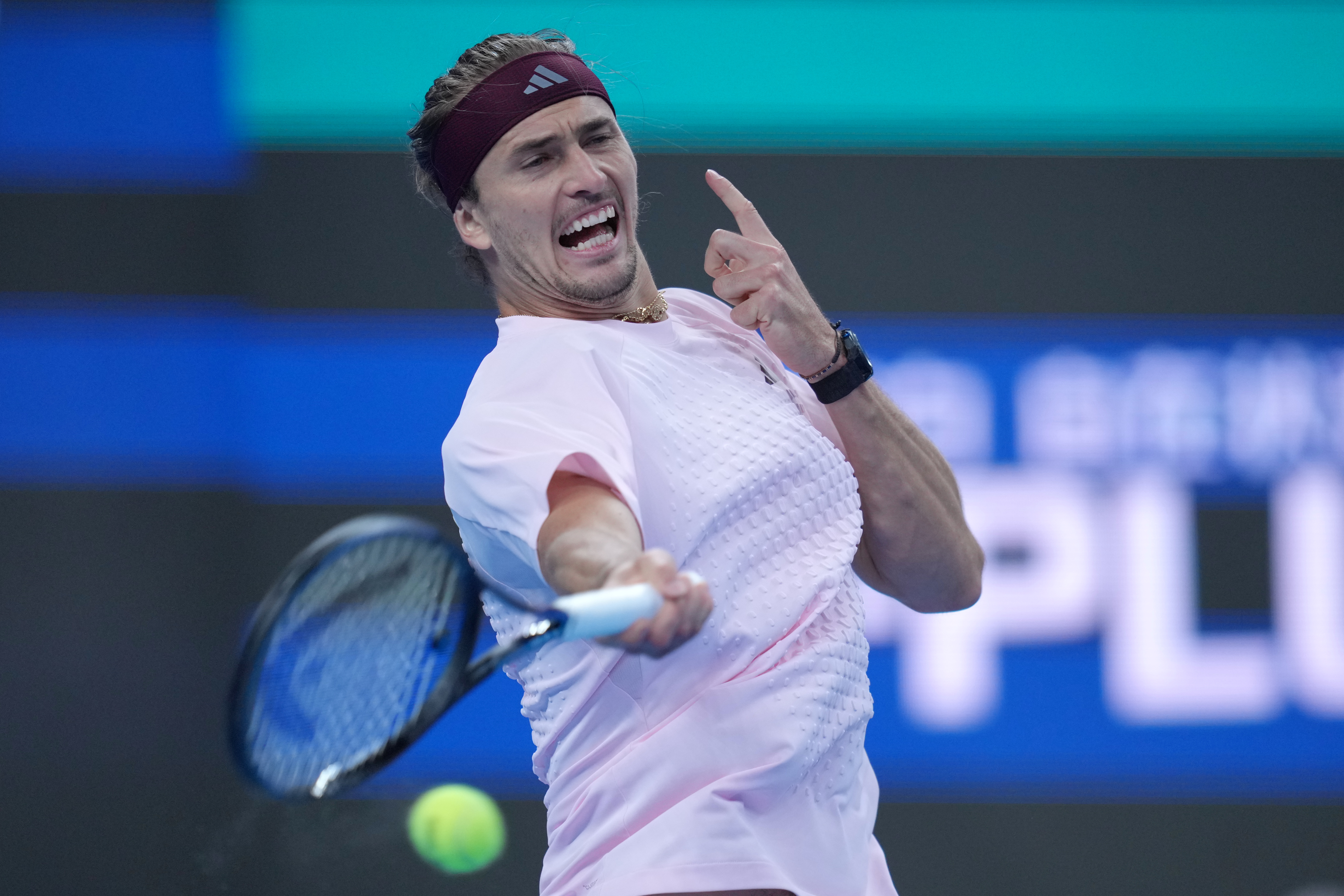 Alexander Zverev, of Germany, returns a ball to Novak Djokovic, of Serbia, during the men's singles quarterfinals match at the China Open tennis tournament in Beijing, Sunday, Oct. 4, 2026. 