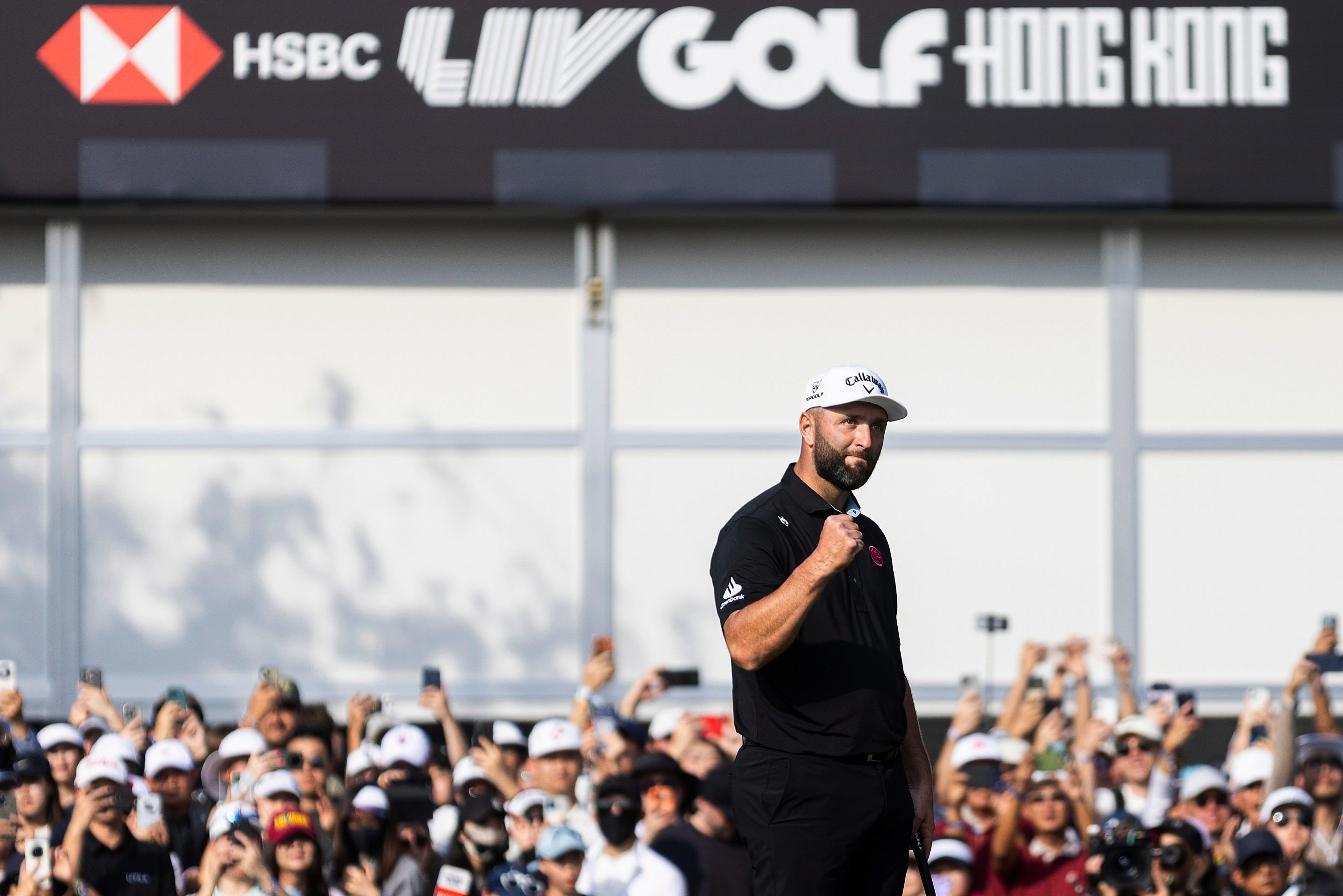 FILE - Captain Jon Rahm of Legion XIII celebrates after putting on the 18th hole green during the final round of HSBC LIV Golf Hong Kong at Hong Kong Golf Club Fanling, Sunday, March 8, 2026 in Hong Kong. 