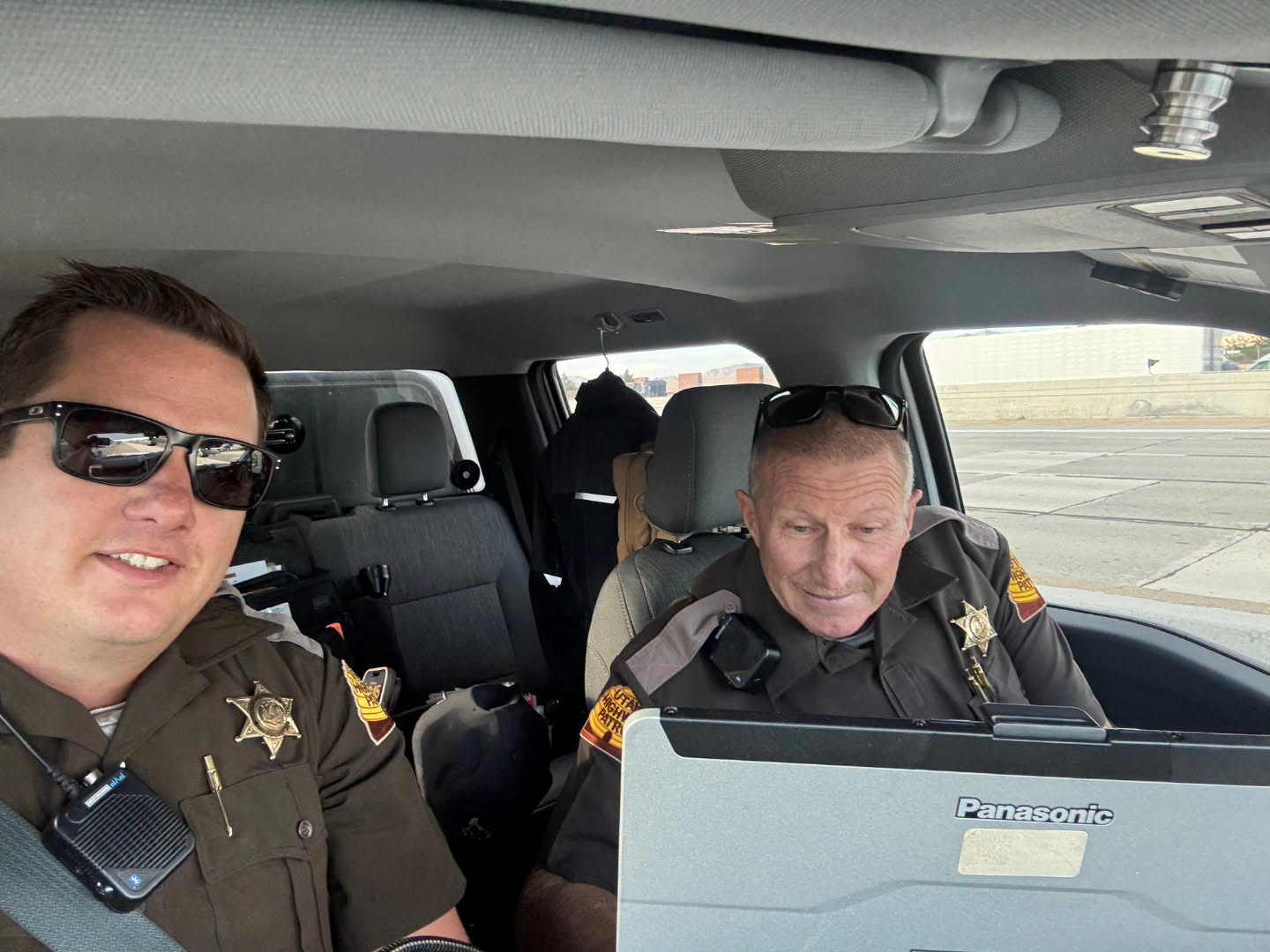 UHP trooper Steve "Odie" Myer is pictured with a coworker.