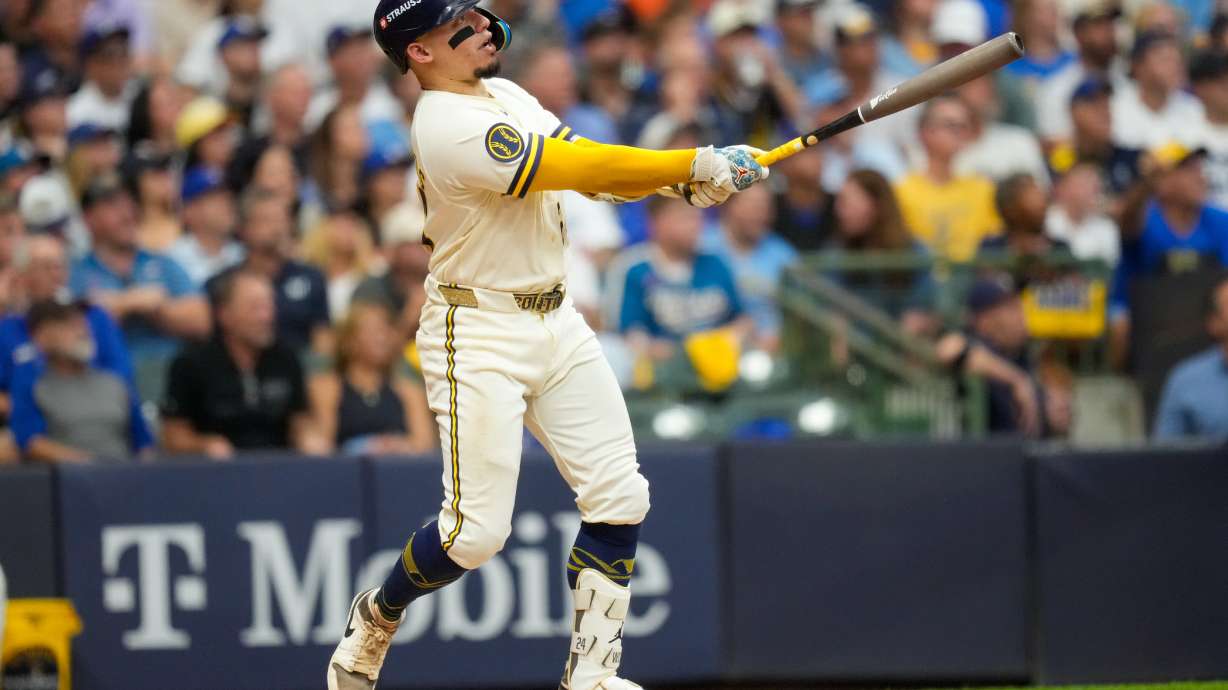 Milwaukee Brewers catcher William Contreras follows through on his solo home run during the fifth inning of Game 2 of baseball's National League Championship Series between the Milwaukee Brewers and the Los Angeles Dodgers, Monday, Oct. 12, 2026, in Milwaukee.