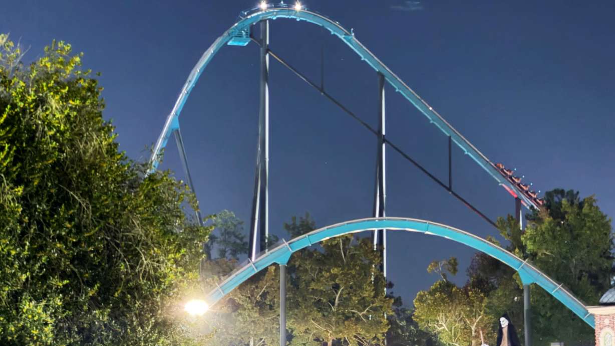 A roller coaster is shown at Six Flags Over Georgia on Monday in Austell, Ga. Police said on Tuesday that an Atlanta man killed on a roller coaster at Six Flags was thrown from the ride and hit other patrons.