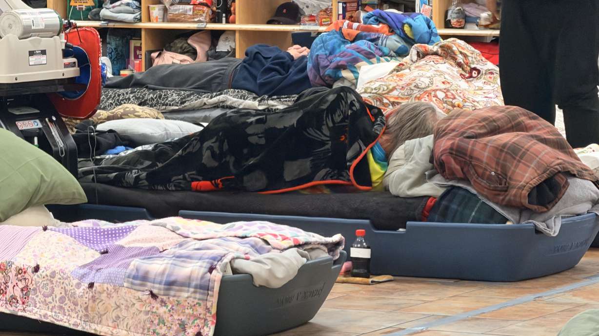 All 120 beds were occupied at a West Valley City shelter on Monday after a colder, wet storm moved in.
