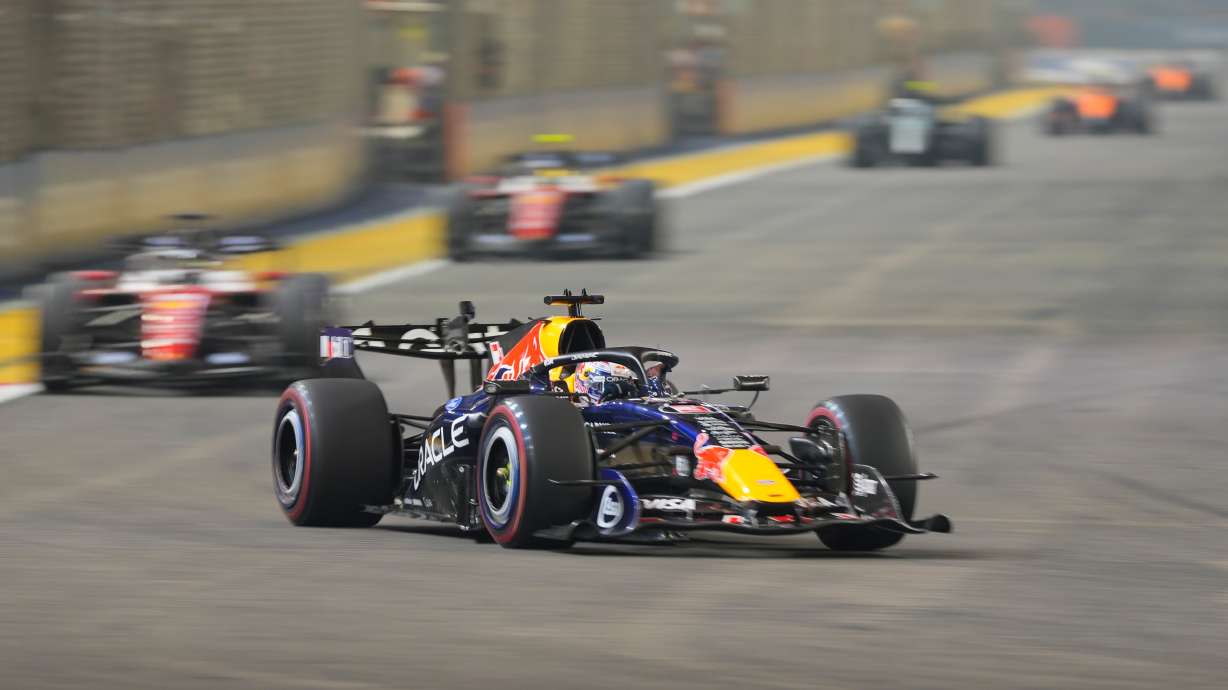 Red Bull driver Max Verstappen of the Netherlands steers his car during the Singapore Formula One Grand Prix race in Singapore, Sunday, Oct. 11, 2026.