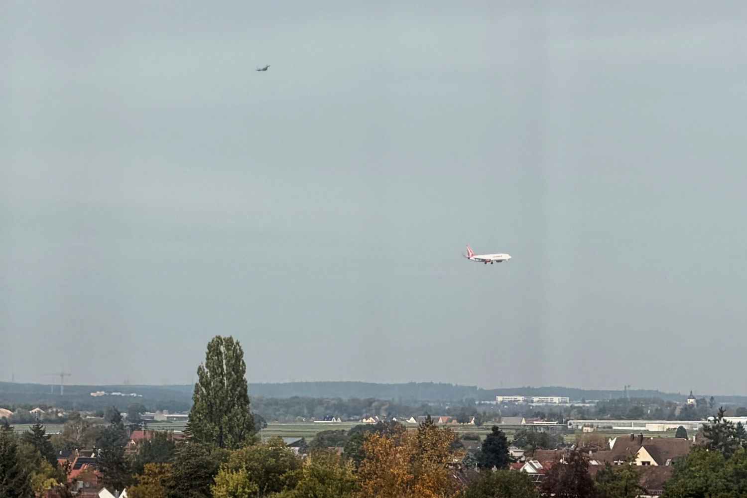 A Eurofighter is seen escorting an aircraft arriving from the Greek island of Corfu on Tuesday. Nuremberg airport was closed to air traffic around noon due to a police operation.