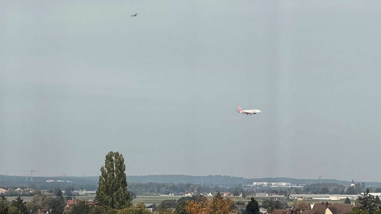 A Eurofighter is seen escorting an aircraft arriving from the Greek island of Corfu on Tuesday. Nuremberg airport was closed to air traffic around noon due to a police operation.