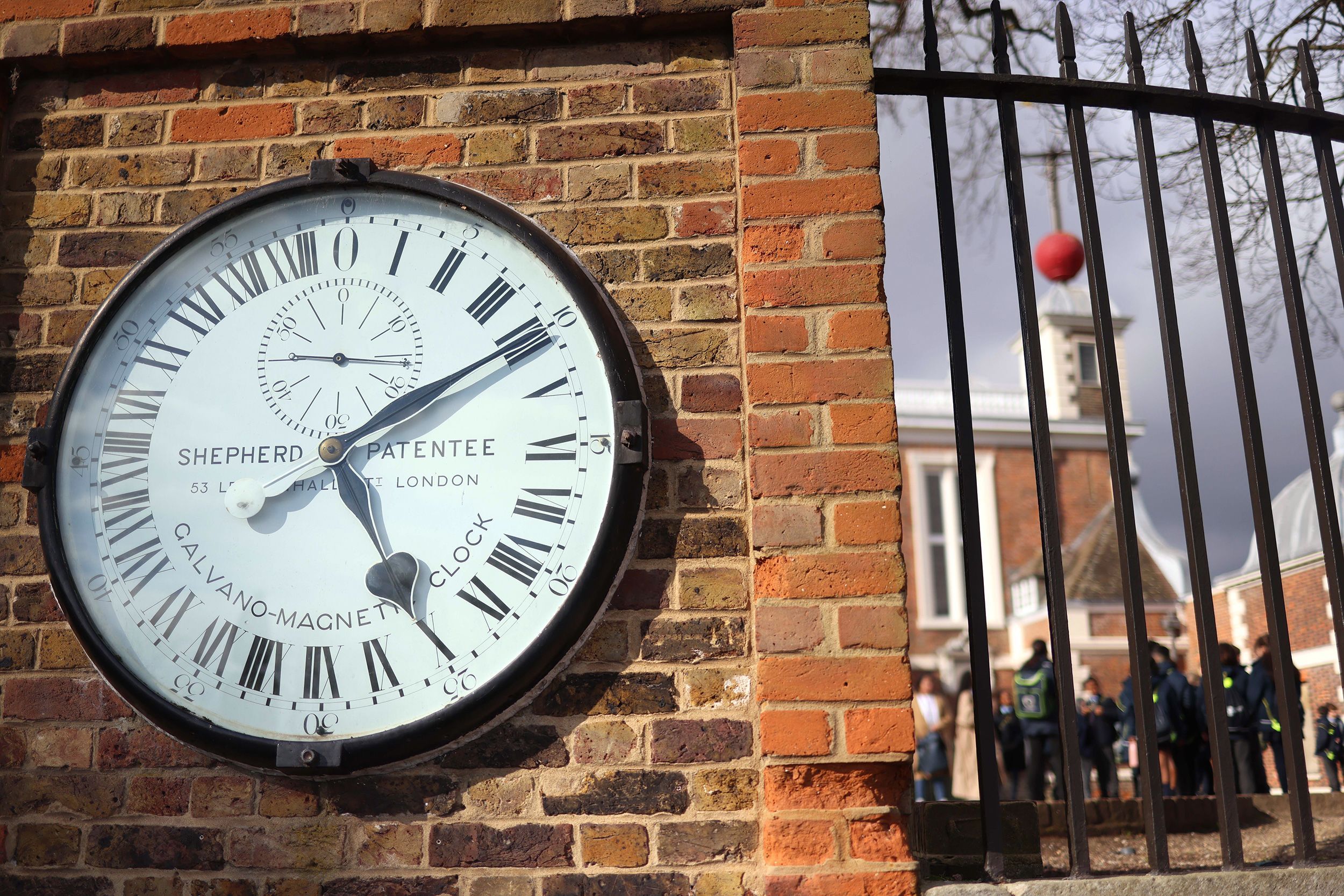 The Shepherd Gate Clock at the Royal Observatory Greenwich in London was the first clock to show Greenwich Mean Time, or GMT, directly to the public. International timekeepers are on track to vote on eliminating what's known as a leap second — a tiny, but many say important, link between Earth's rotation and the world's time standard.