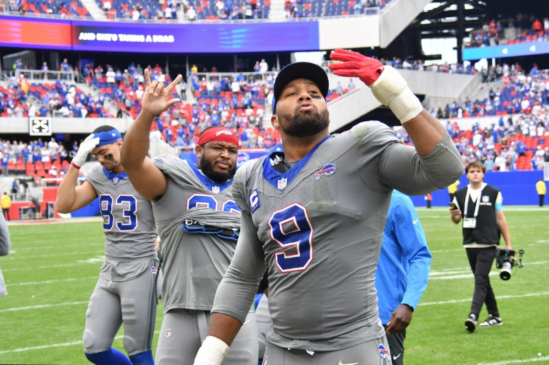 Sep 27, 2026; Orchard Park, New York, USA;  Buffalo Bills linebacker Bradley Chubb (9) and defensive back Te'cory Couch (33) react after the game against the Los Angeles Chargers at New Highmark Stadium.