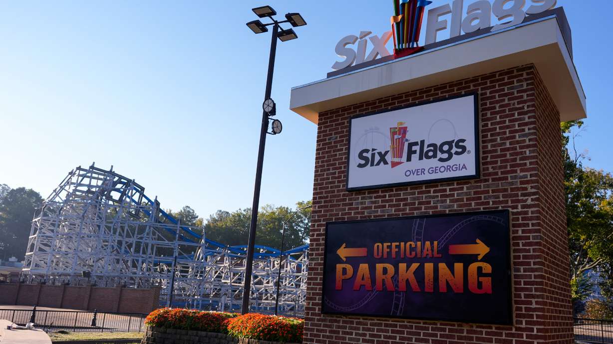 Attractions are seen at Six Flags Over Georgia, about 15 miles northwest of Atlanta, Tuesday. Police said an Atlanta man killed on a roller coaster at the park was thrown from his seat and struck other patrons before landing below.