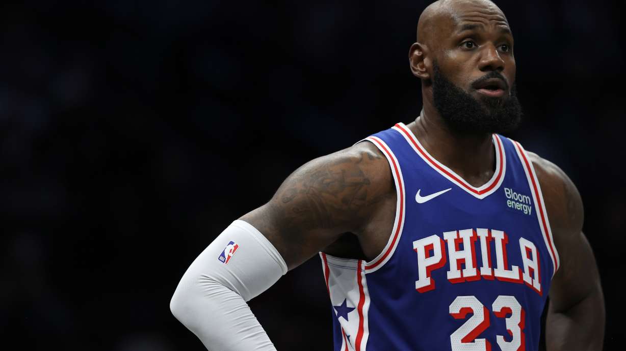 Philadelphia 76ers' LeBron James looks on during the first half of a preseason NBA basketball game against the Brooklyn Nets, Thursday, Oct. 8, 2026, in New York.