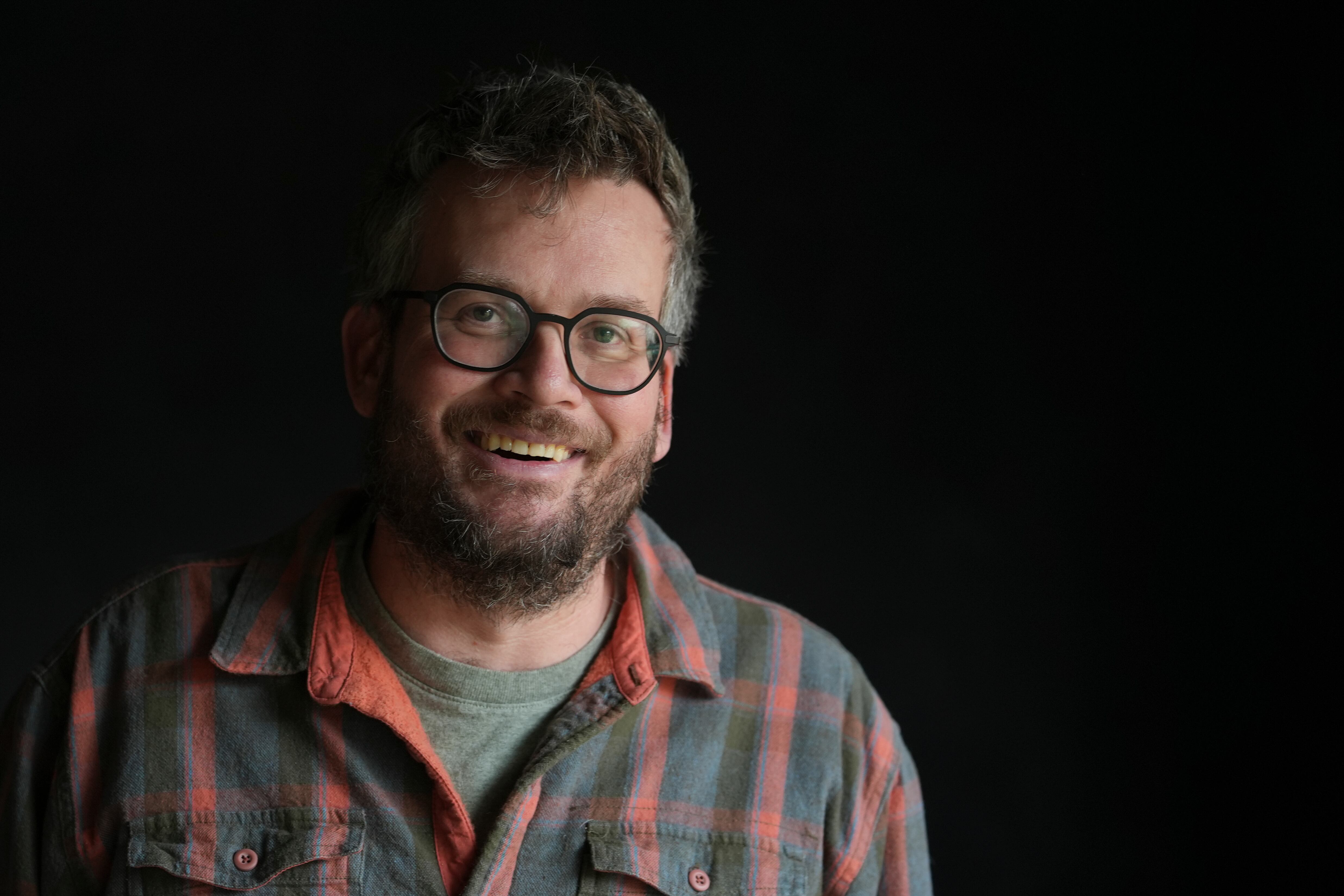 Writer John Green poses in his studio in Indianapolis, Ind., Jan. 21. Green's tour for "Hollywood, Ending," made a stop in Salt Lake City at West High School on Saturday.
