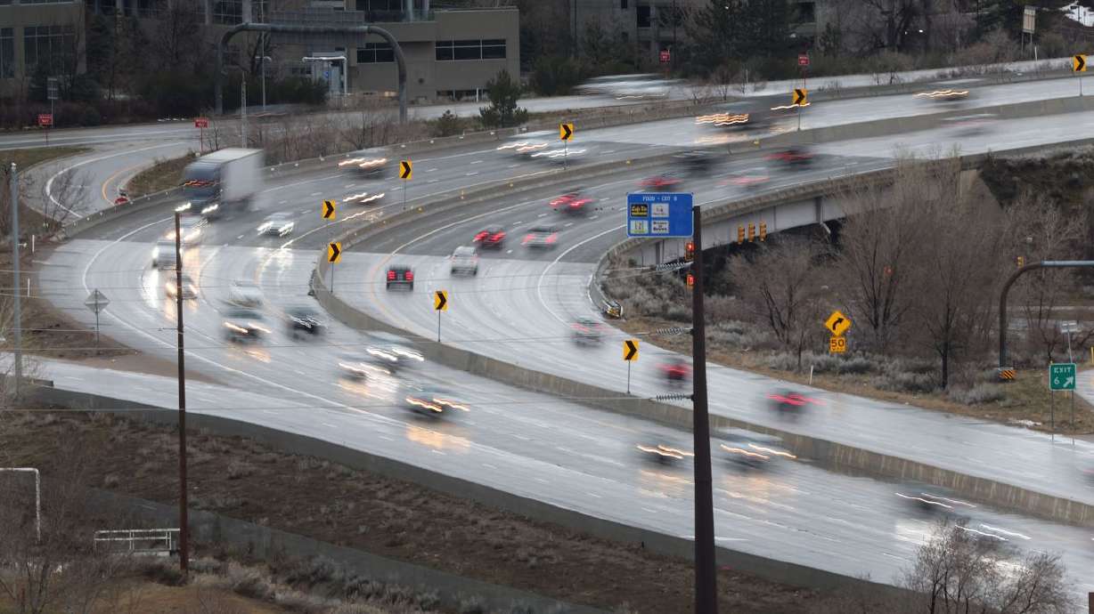 Motorists drive on I-215 in the rain in Holladay on March 15, 2023. If drivers have forgotten safety guidelines for winter driving, the Utah Highway Patrol has these reminders.