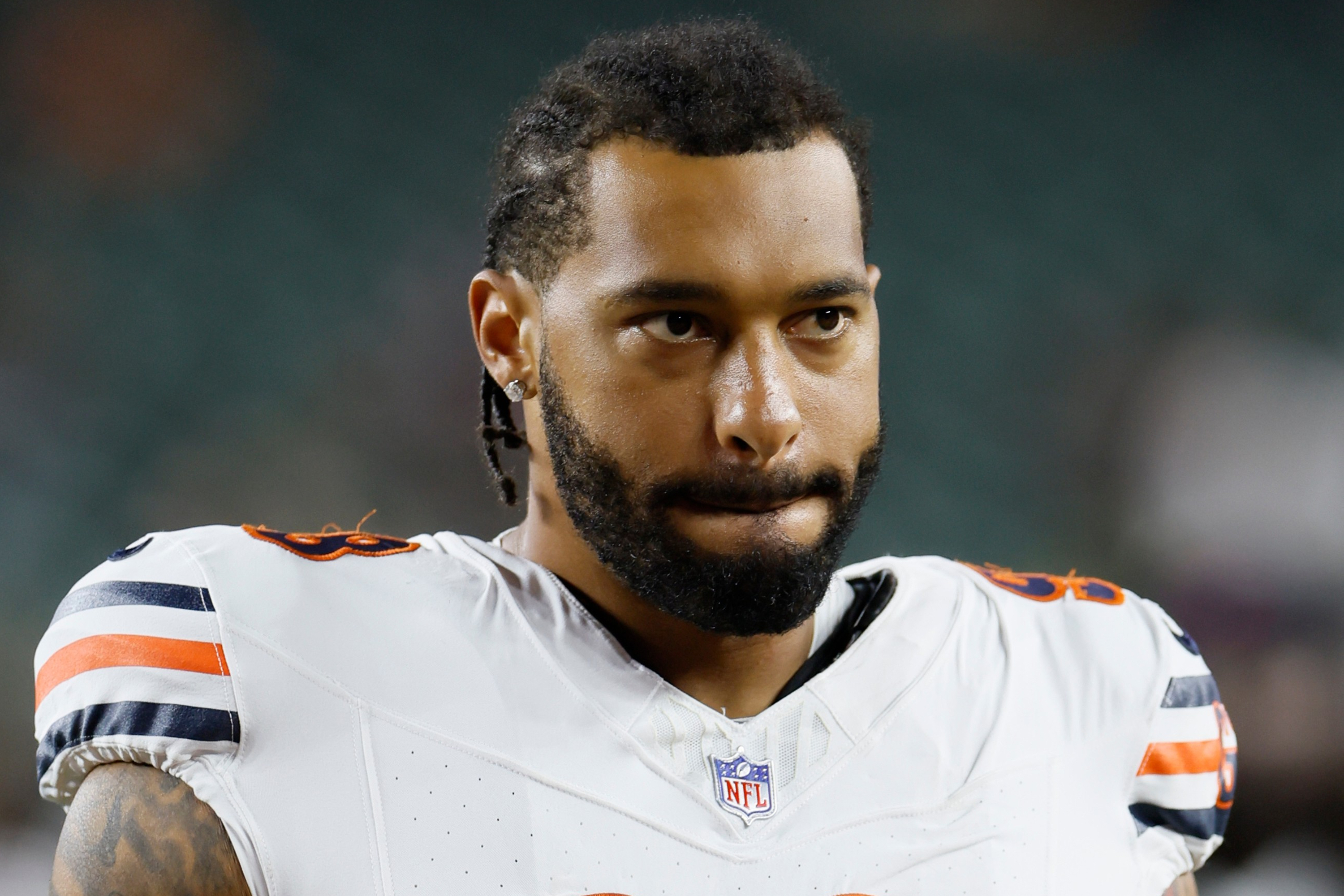 FILE - Chicago Bears defensive lineman Montez Sweat leaves the field after an NFL preseason football game against the Cincinnati Bengals in Cincinnati, Aug. 22, 2026. 