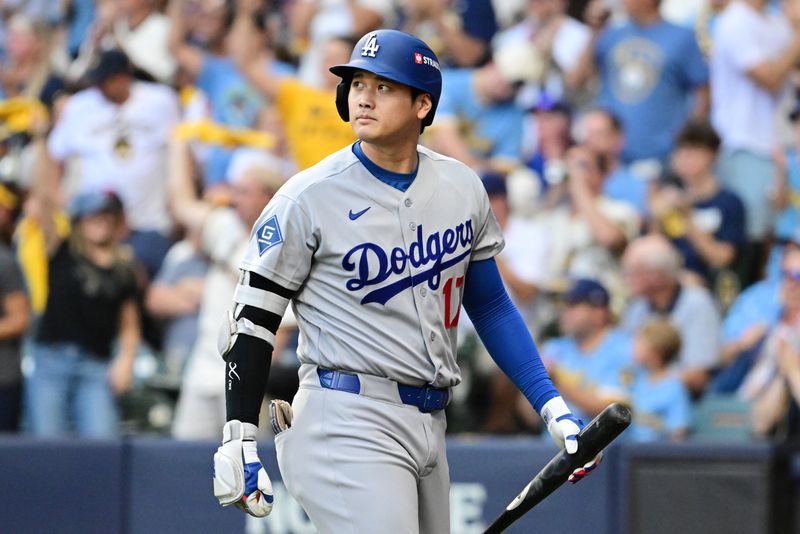 Oct 12, 2026; Milwaukee, Wisconsin, USA;  Los Angeles Dodgers pitcher Shohei Ohtani (17) reacts after striking out against the Milwaukee Brewers during the first inning in game two of the NLCS for the 2026 MLB Playoffs at American Family Field.