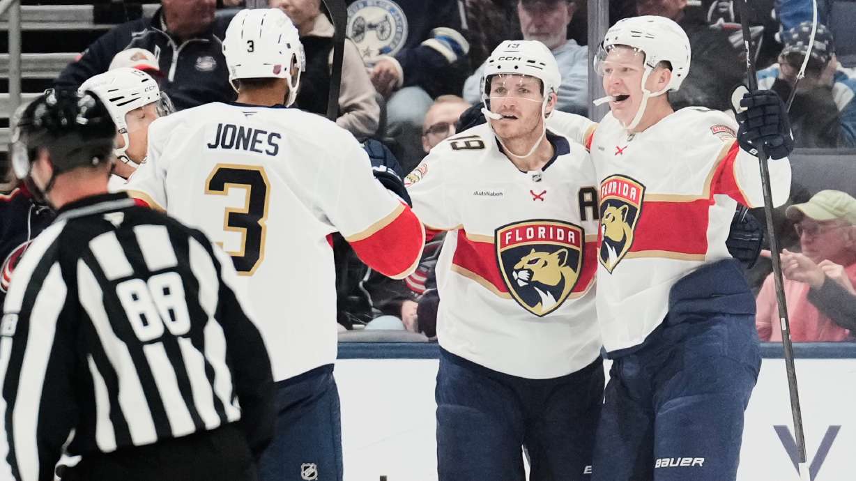 Florida Panthers left wing Brady Tkachuk, right, celebrates his goal against the Columbus Blue Jackets with Seth Jones (3) and Matthew Tkachuk (19) in the second period of an NHL hockey game in Columbus, Ohio, Tuesday, Oct. 13, 2026.