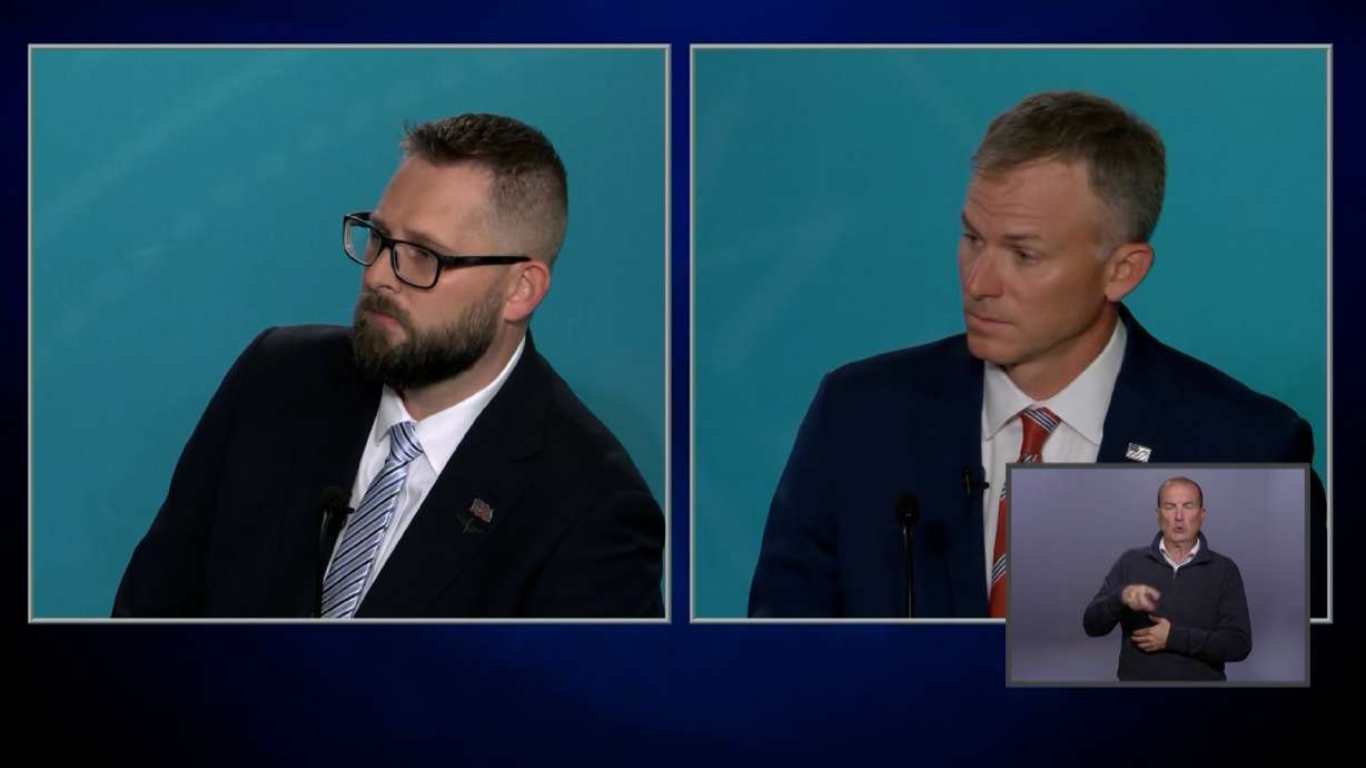 Democrat Peter Crosby (left) and Republican Blake Moore (right) debated each other on Tuesday, ahead of the November Election.