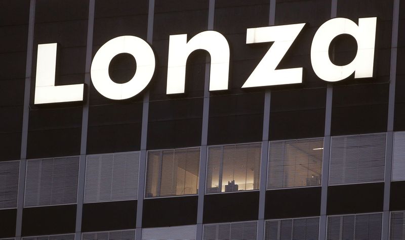 FILE PHOTO: The logo of Swiss contract drug maker Lonza is seen at its headquarters in Basel, Switzerland October 1, 2020.