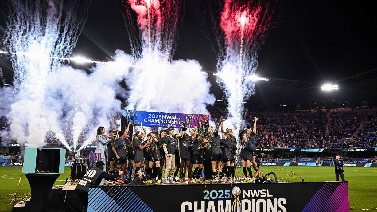 FILE - NJ/NY Gotham FC lift the NWSL championship trophy after defeating the Washington Spirit in a NWSL women's championship soccer match, Nov. 22, 2025, in San Jose, Calif.
