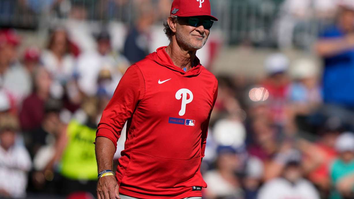 Philadelphia Phillies interim manager Don Mattingly walks to the mound against the Atlanta Braves in the seventh inning during Game 2 of baseball's National League Wild Card Series Wednesday, Sept. 30, 2026, in Atlanta.