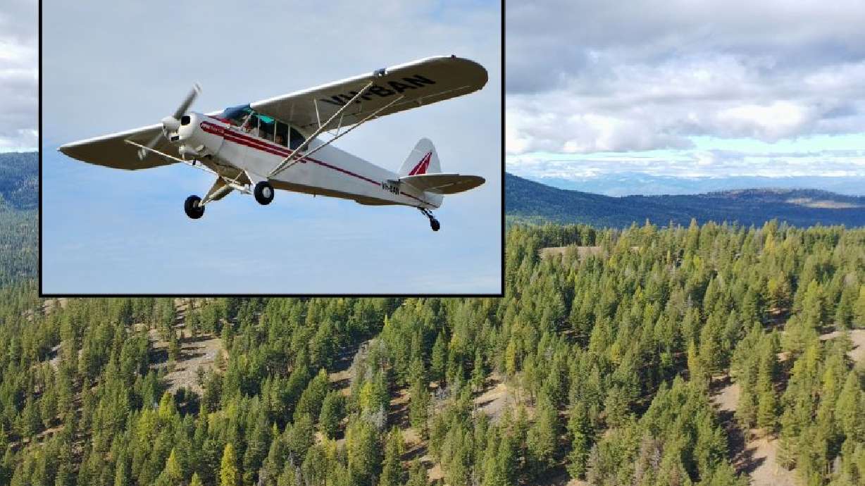 A stock photo of the 1976 Piper Cub that went missing in front of a photo of the area searched for a missing plane that went down on the way to Idaho, Monday. The pilot and passenger of the plane were found dead on Sunday in the area.