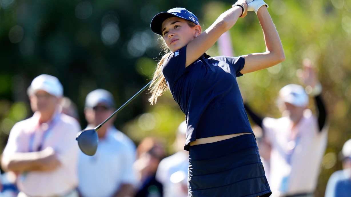 FILE - Kai Trump, granddaughter of President Donald Trump, hits her tee shot on the 16th hole during the first round of The Annika LPGA golf tournament Thursday, Nov. 13, 2025, in Belleair, Fla.