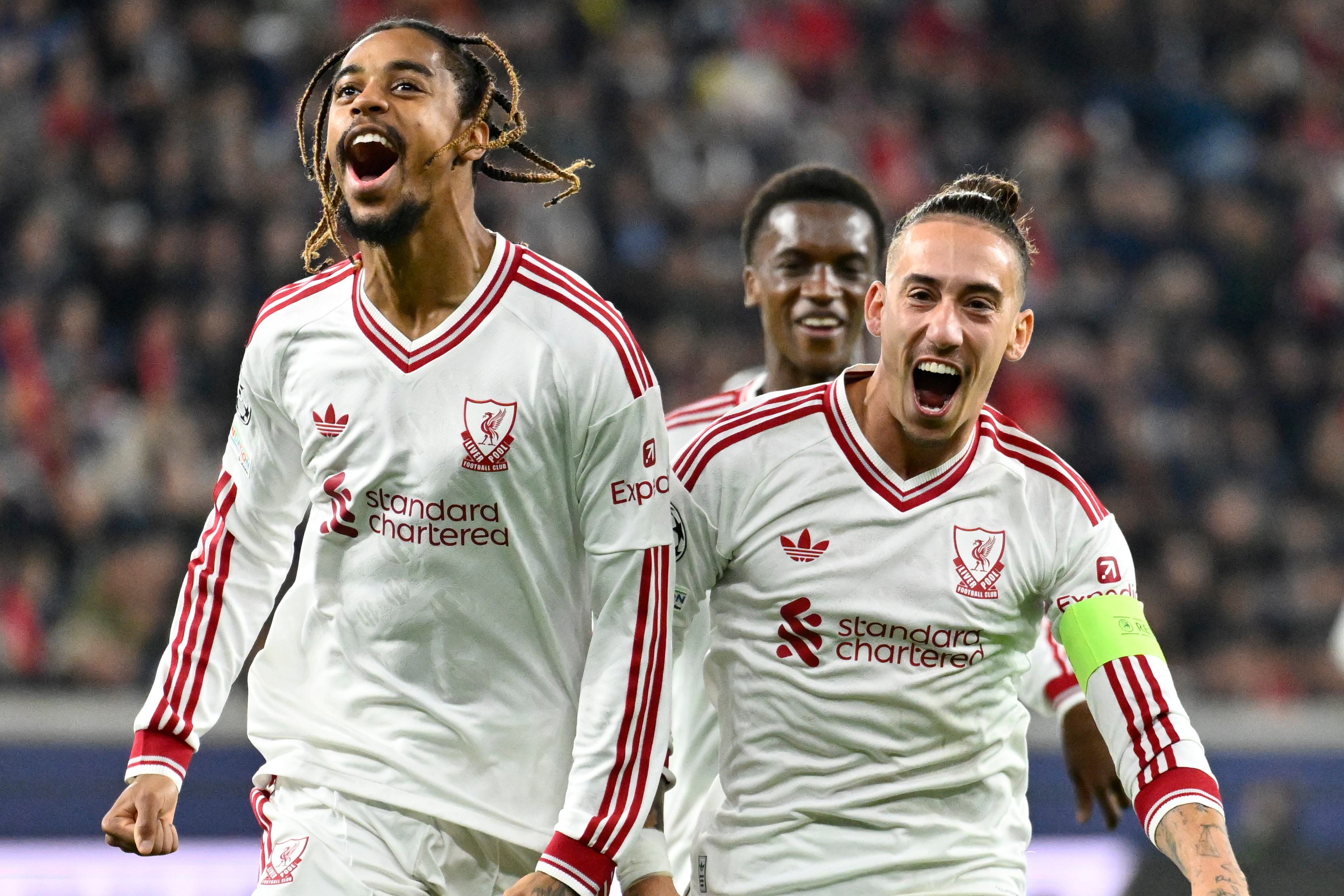 Liverpool's Bradley Barcola, left, celebrates after scoring his side's second goal during the Champions League opening phase soccer match between LASK and Liverpool in Linz, Austria, Wednesday, Oct. 14, 2026. 