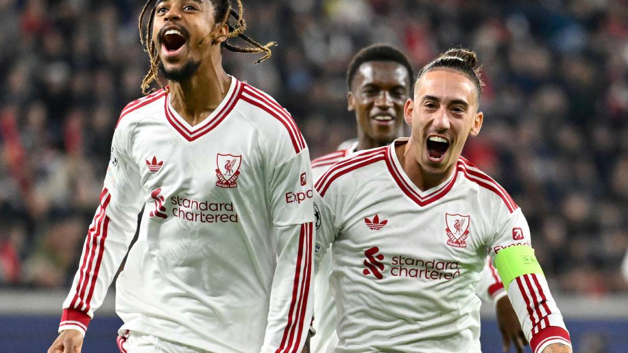 Liverpool's Bradley Barcola, left, celebrates after scoring his side's second goal during the Champions League opening phase soccer match between LASK and Liverpool in Linz, Austria, Wednesday, Oct. 14, 2026.