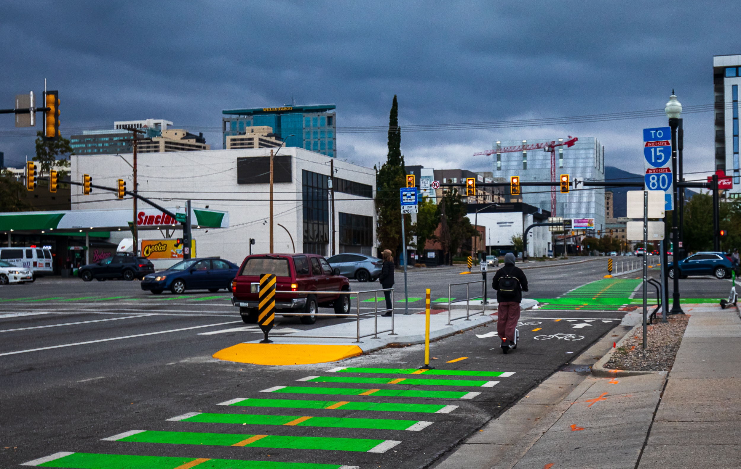 A person rides an e-scooter on the 400 South Viaduct Trail bike lanes in Salt Lake City on Wednesday.