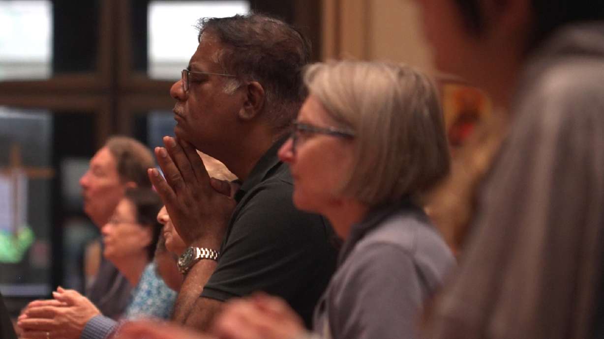 In this screengrab made from video, people pray at a votive mass for Pope Leo XIV in light of his lung cancer diagnosis at Holy Name Cathedral in Chicago, Wednesday.