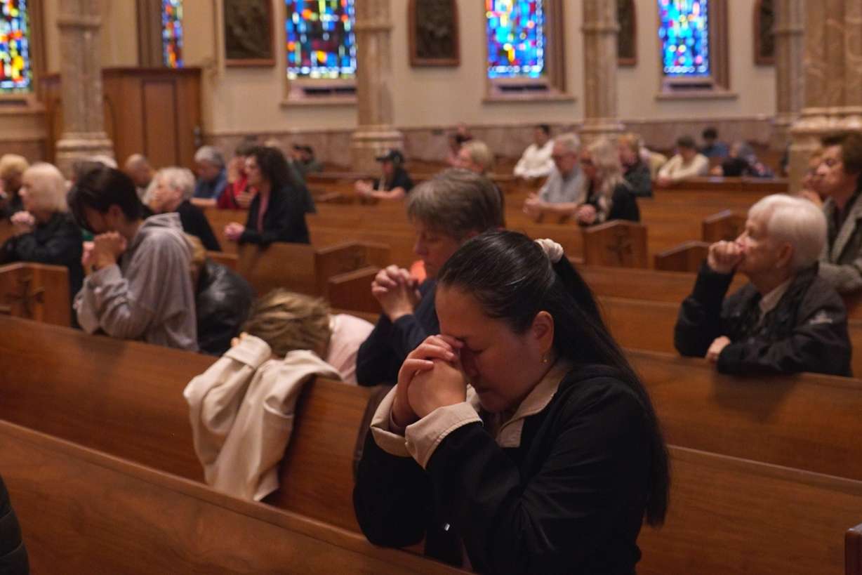In this screengrab made from video, people pray at a votive mass for Pope Leo XIV in light of his lung cancer diagnosis at Holy Name Cathedral in Chicago, Wednesday.